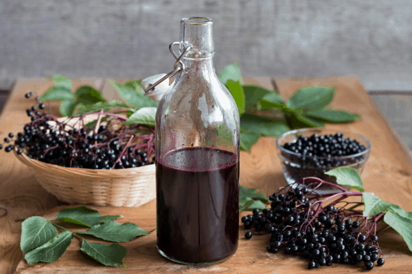 This recipe for DIY elderberry syrup is so incredibly easy and it tastes amazing! You can also make homemade elderberry syrup with essential oils for added tastes and benefits but for this recipe I left them out just for simplicity. Elderberry syrup is well known to help get rid of sickness naturally before you have to resort to behind the counter options so it’s definitely worth a try! #elderberrysyrup #health #immunity