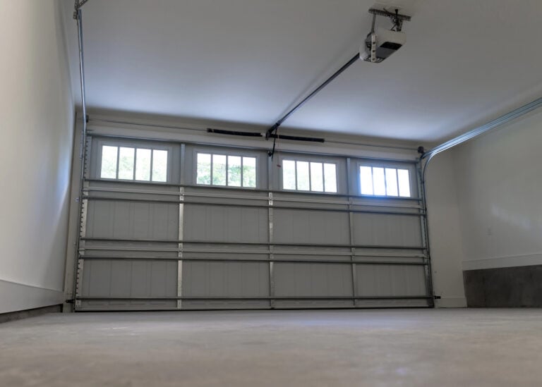 Inside of a garage and garage door.