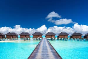 Maldives sea and luxurious overwater bungalows.