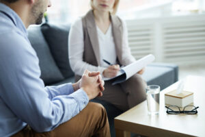 Man talking to a therapist