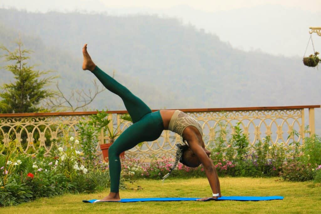 Woman doing yoga outside.